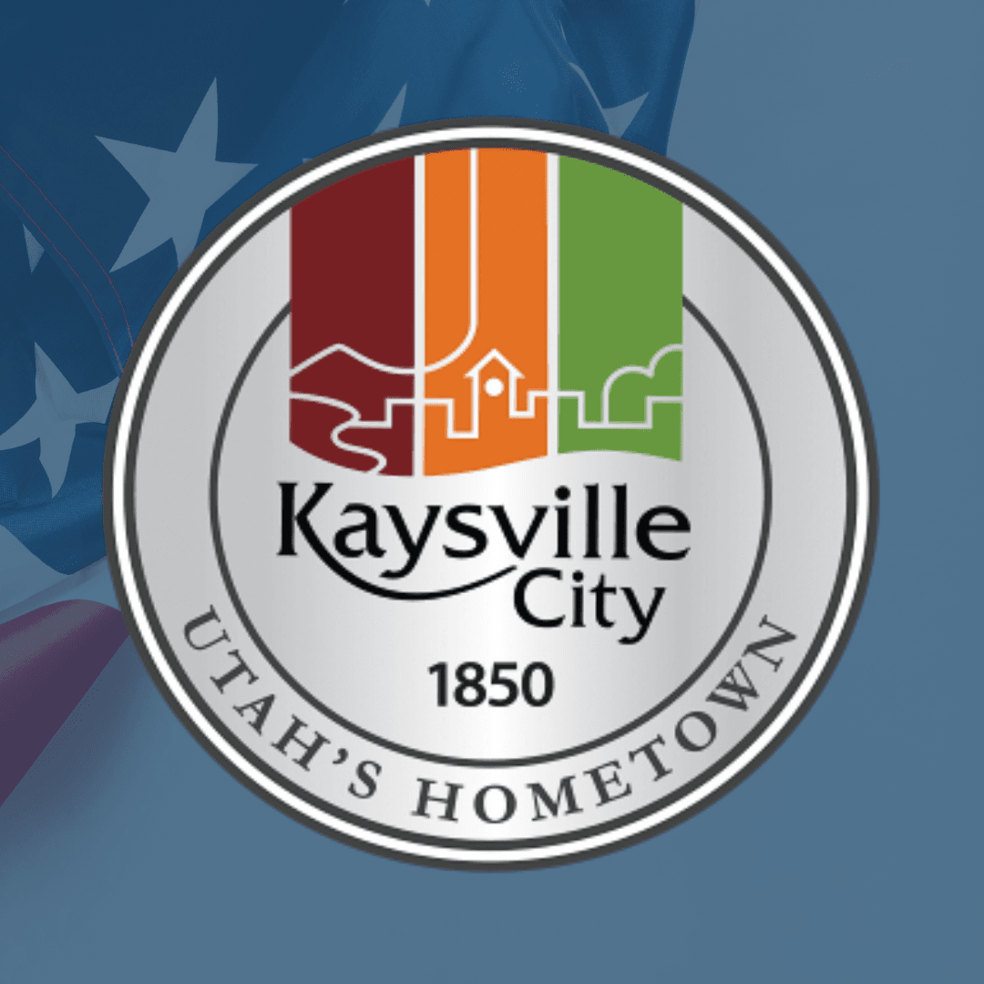 Kaysville City seal with flag background